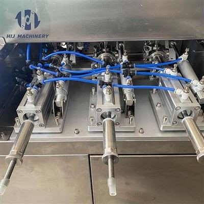 Detailed view of the film unwinding and forming station on the HIJ-CD120
