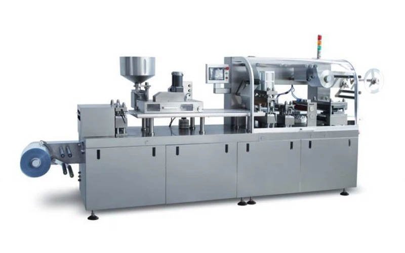 Liquid blister packaging machine producing pharmaceutical unit-dose packs on an automated production line