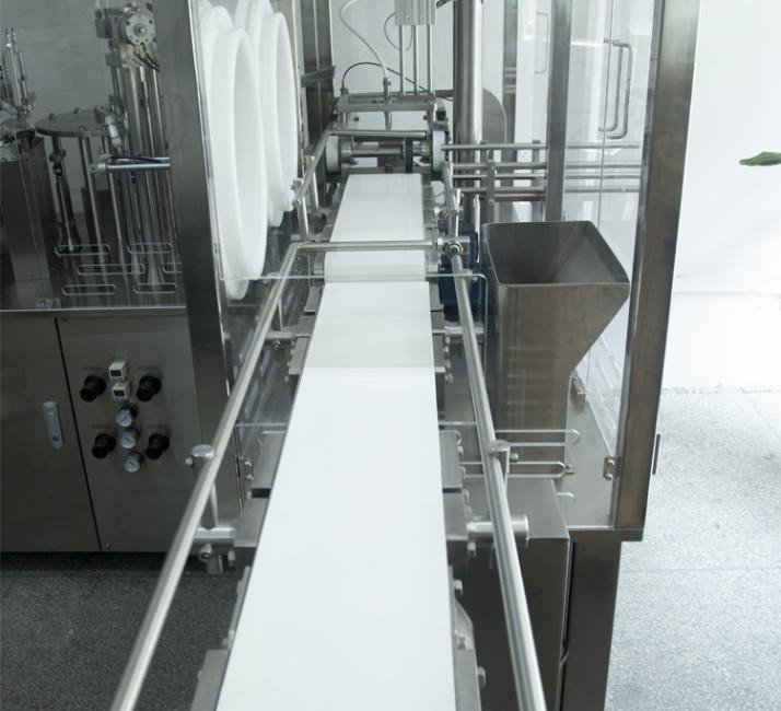 Automatic Syringe Loading and Denesting System