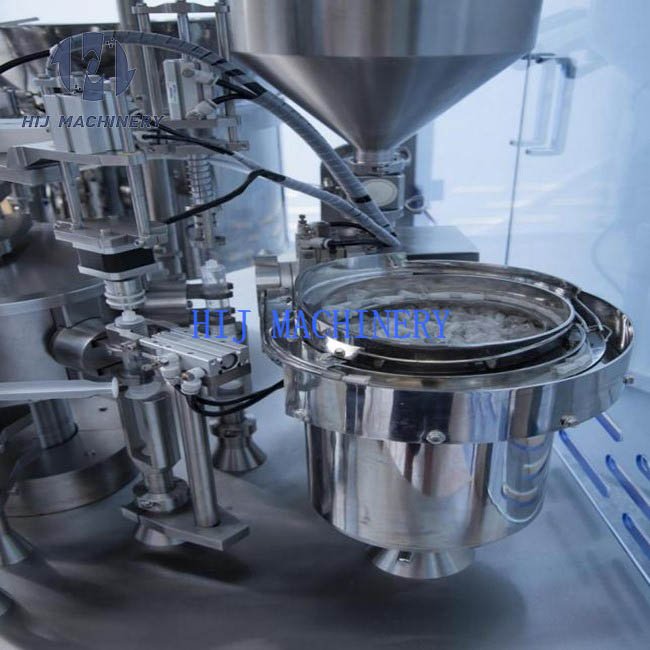 Automatic cap feeding system