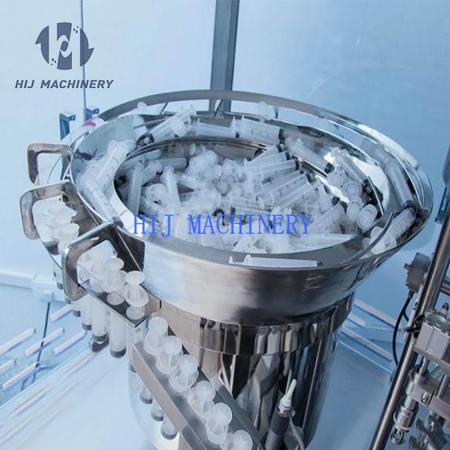 Automatic syringe loading station