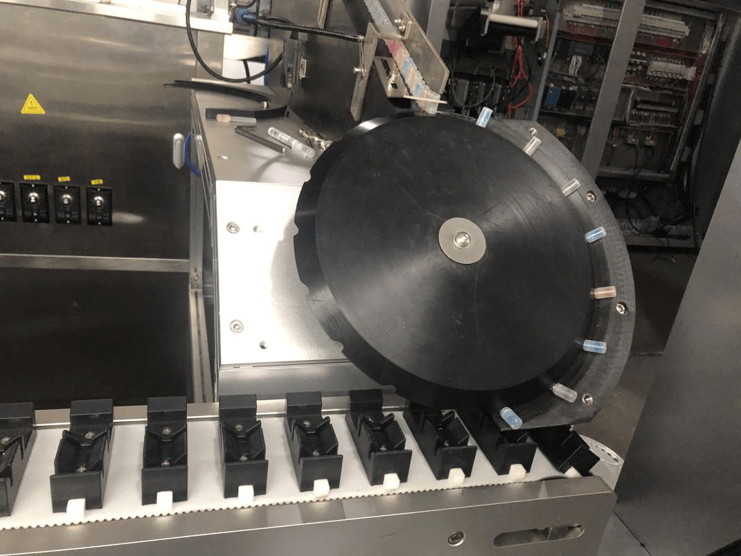 Pre-filled syringe discharging device (star-wheel, from labeling line) — HIJ PBL-400S blister cartoning machine
