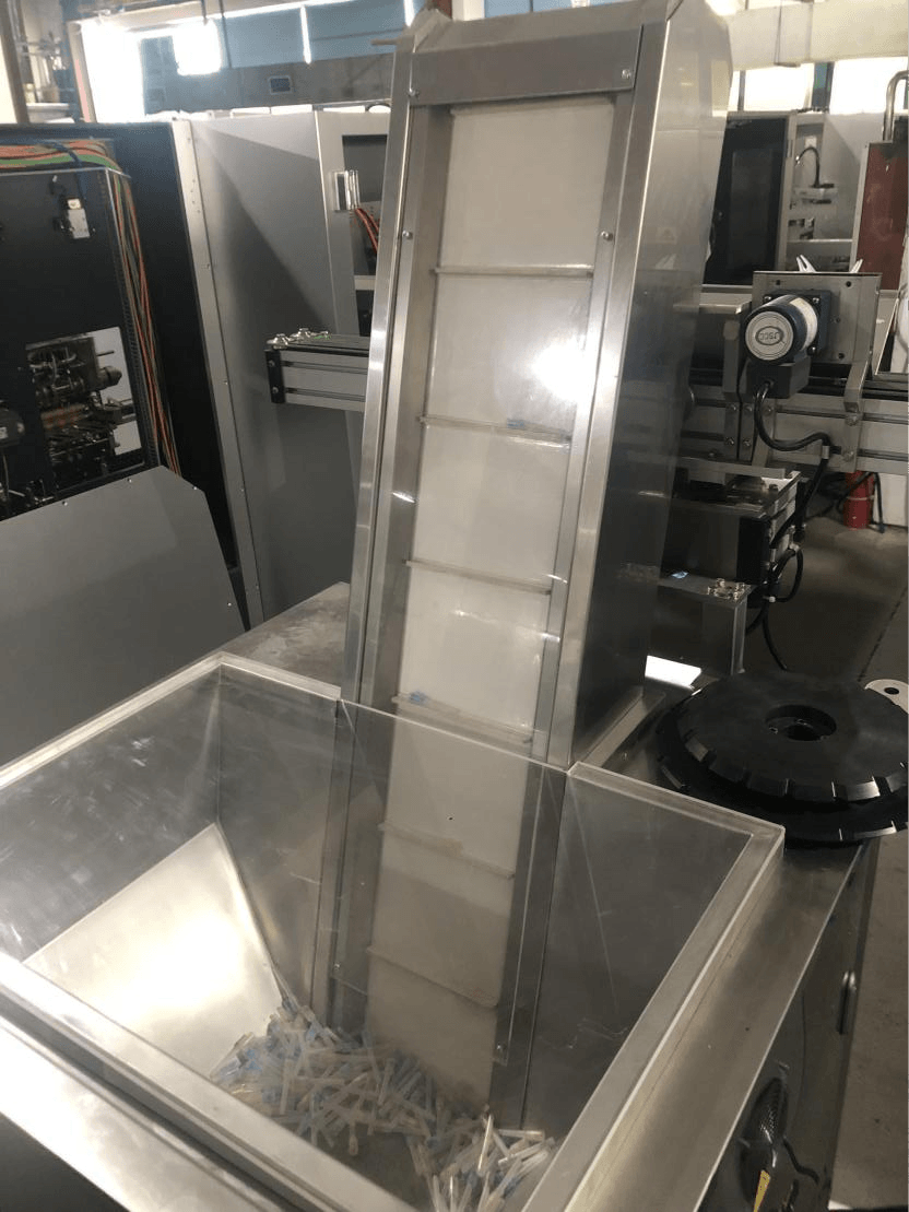 Vibrating bucket needle & plunger feeder — HIJ PBL-400S blister cartoning machine