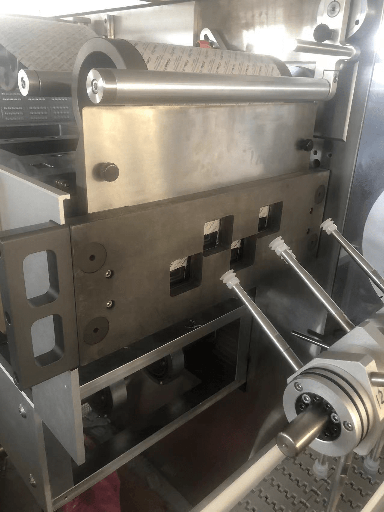 PVC film feeding chute and guide roller on DPH-380B tablet blister packing machine